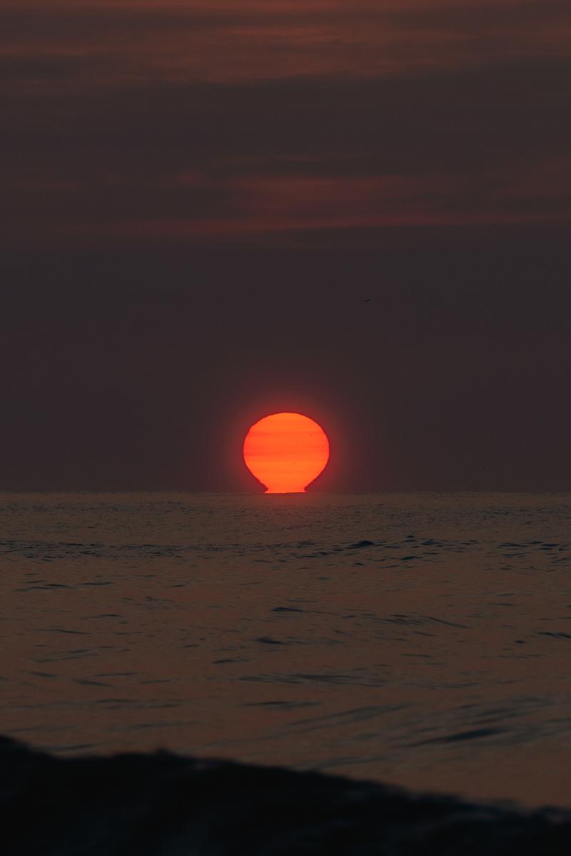 Red Sun Rising Over Water - Fine Art Photography Print by Zeefeldt Photography